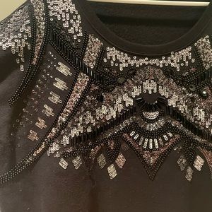 Woman’s embellished crew neck